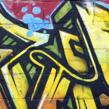 Konturlar ve gölgeleme yakın ile renkli sokak sanatı grafiti resimlerinin parçası. Gençlik çağdaş sanat kültürünün arka plan dokusu. Sarı turuncu ve kahverengi renkler