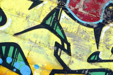 Konturlar ve gölgeleme yakın ile renkli sokak sanatı grafiti resimlerinin parçası. Gençlik çağdaş sanat kültürünün arka plan dokusu. Sarı turuncu ve kahverengi renkler