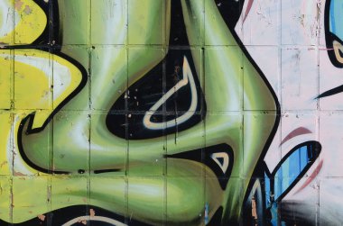 Konturlar ve gölgeleme yakın ile renkli sokak sanatı grafiti resimlerinin parçası. Gençlik çağdaş sanat kültürünün arka plan dokusu. Yeşil sarı renkler
