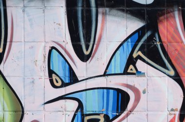 Konturlar ve gölgeleme yakın ile renkli sokak sanatı grafiti resimlerinin parçası. Gençlik çağdaş sanat kültürünün arka plan dokusu. Sarı turuncu ve kahverengi renkler