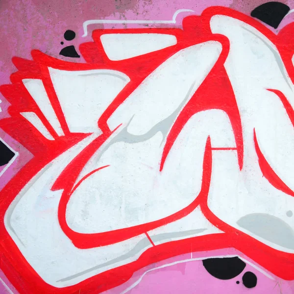 輪郭とシェーディングがクローズアップされた色付きのストリートアートの落書き絵の断片 青少年現代美術文化の背景テクスチャー ピンクの赤と黒の色 — ストック写真
