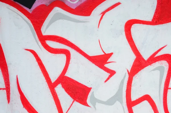 輪郭とシェーディングがクローズアップされた色付きのストリートアートの落書き絵の断片 青少年現代美術文化の背景テクスチャー ピンクの赤と黒の色 — ストック写真