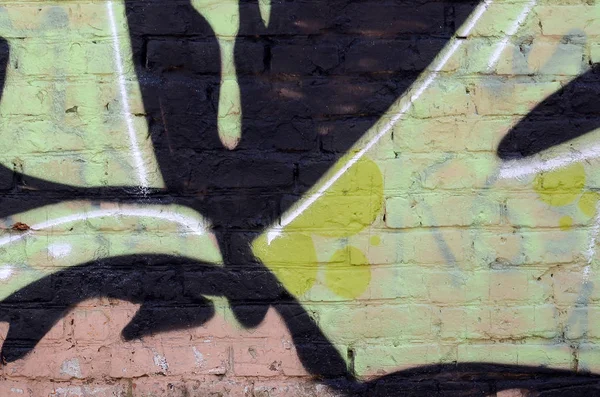 輪郭とシェーディングがクローズアップされた色付きのストリートアートの落書き絵の断片 青少年現代美術文化の背景テクスチャー 緑の黄色 — ストック写真