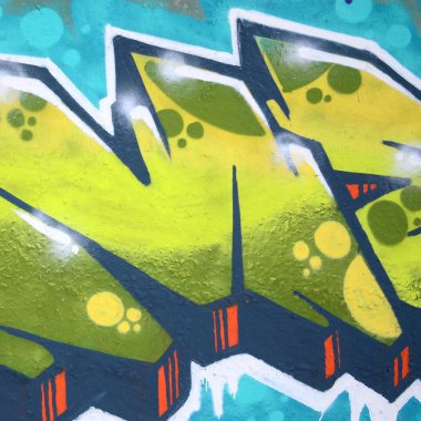 Konturlar ve gölgeleme yakın ile renkli sokak sanatı grafiti resimlerinin parçası. Gençlik çağdaş sanat kültürünün arka plan dokusu. Yeşil ve sarı renkler