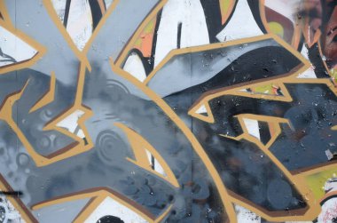 Konturlar ve gölgeleme yakın ile renkli sokak sanatı grafiti resimlerinin parçası. Gençlik çağdaş sanat kültürünün arka plan dokusu. Gri ve turuncu renkler