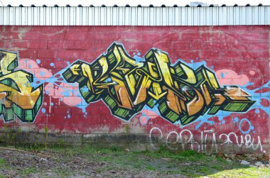 Konturlar ve gölgeleme yakın ile renkli sokak sanatı grafiti resimlerinin parçası. Gençlik çağdaş sanat kültürünün arka plan dokusu. Sarı turuncu ve kahverengi renkler