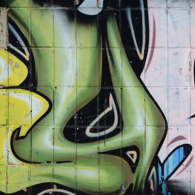 Konturlar ve gölgeleme yakın ile renkli sokak sanatı grafiti resimlerinin parçası. Gençlik çağdaş sanat kültürünün arka plan dokusu. Yeşil sarı renkler