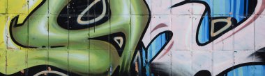 Konturlar ve gölgeleme yakın ile renkli sokak sanatı grafiti resimlerinin parçası. Gençlik çağdaş sanat kültürünün arka plan dokusu. Yeşil sarı renkler