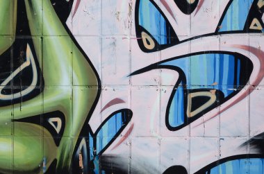 Konturlar ve gölgeleme yakın ile renkli sokak sanatı grafiti resimlerinin parçası. Gençlik çağdaş sanat kültürünün arka plan dokusu. Yeşil sarı renkler