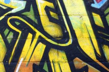 Konturlar ve gölgeleme yakın ile renkli sokak sanatı grafiti resimlerinin parçası. Gençlik çağdaş sanat kültürünün arka plan dokusu. Sarı turuncu ve kahverengi renkler