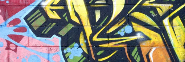 彩色街头艺术涂鸦画的碎片与轮廓和着色特写 青年当代艺术文化的背景纹理 黄色橙色和棕色 — 图库照片