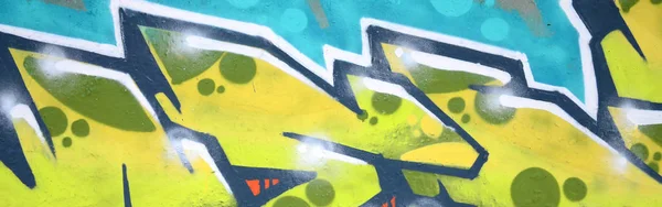 彩色街头艺术涂鸦画的碎片与轮廓和着色特写 青年当代艺术文化的背景纹理 绿色和黄色 — 图库照片