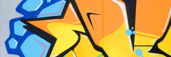 輪郭とシェーディングがクローズアップされた色付きのストリートアートの落書き絵の断片 青少年現代美術文化の背景テクスチャー オレンジの黄色と緑の色 — ストック写真