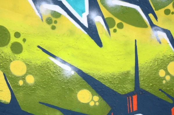 輪郭とシェーディングがクローズアップされた色付きのストリートアートの落書き絵の断片 青少年現代美術文化の背景テクスチャー 緑と黄色の色 — ストック写真