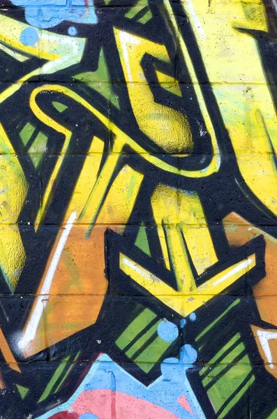 彩色街头艺术涂鸦画的碎片与轮廓和着色特写 青年当代艺术文化的背景纹理 黄色橙色和棕色 — 图库照片