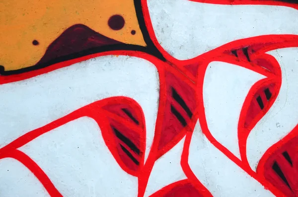 輪郭とシェーディングがクローズアップされた色付きのストリートアートの落書き絵の断片 青少年現代美術文化の背景テクスチャー オレンジ 黒の色 — ストック写真