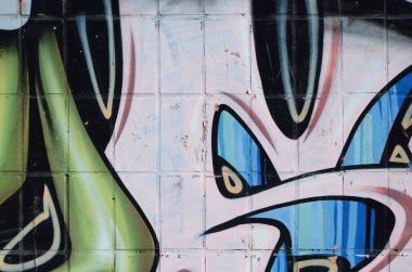 Konturlar ve gölgeleme yakın ile renkli sokak sanatı grafiti resimlerinin parçası. Gençlik çağdaş sanat kültürünün arka plan dokusu. Yeşil sarı renkler