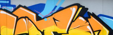 Konturlar ve gölgeleme yakın ile renkli sokak sanatı grafiti resimlerinin parçası. Gençlik çağdaş sanat kültürünün arka plan dokusu. Turuncu sarı ve yeşil renkler