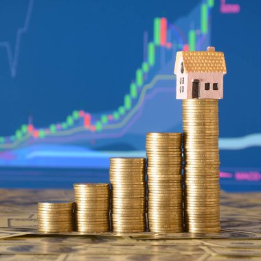 Bir ev kavramı satın almak için paralar planlama tasarruf para