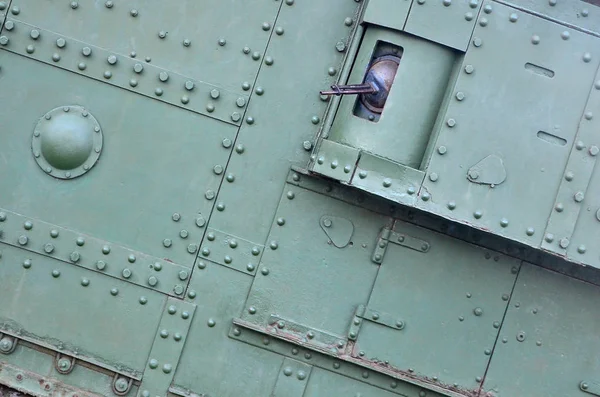 Abstract green industrial metal textured background with rivets and bolts