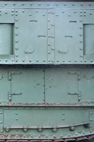 Struttura della parete laterale del serbatoio, in metallo e rinforzata con una moltitudine di bulloni e rivetti — Foto Stock