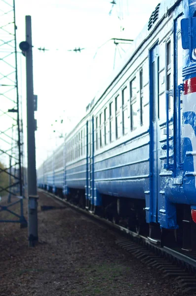 Old soviet electric train with outdated design moving by rail — Stock Photo, Image