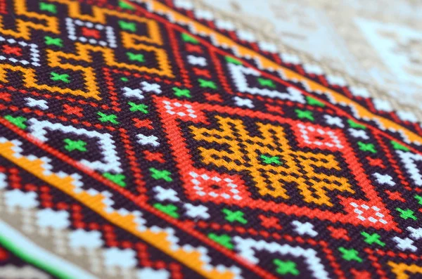 Traditional Ukrainian folk art knitted embroidery pattern on textile fabric — Stock Photo, Image