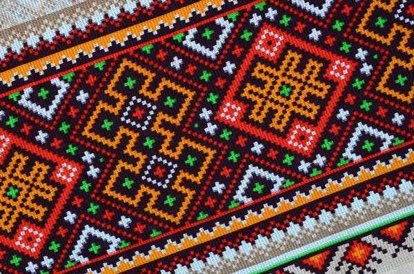 Traditional Ukrainian folk art knitted embroidery pattern on textile fabric — Stock Photo, Image