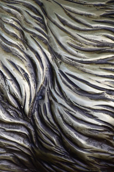 stock image Details and decorative bas-relief ornament from metal of forged stamping iron gate as background texture