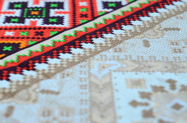 Traditional Ukrainian folk art knitted embroidery pattern on textile fabric — Stock Photo, Image