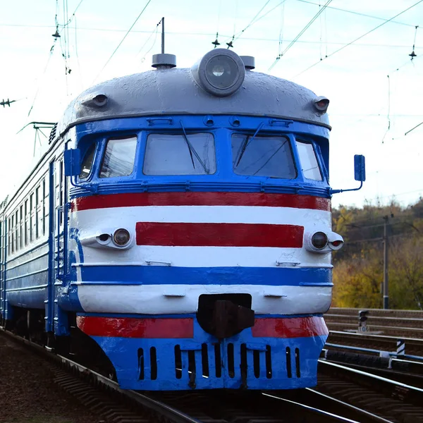 Old soviet electric train with outdated design moving by rail — Stock Photo, Image