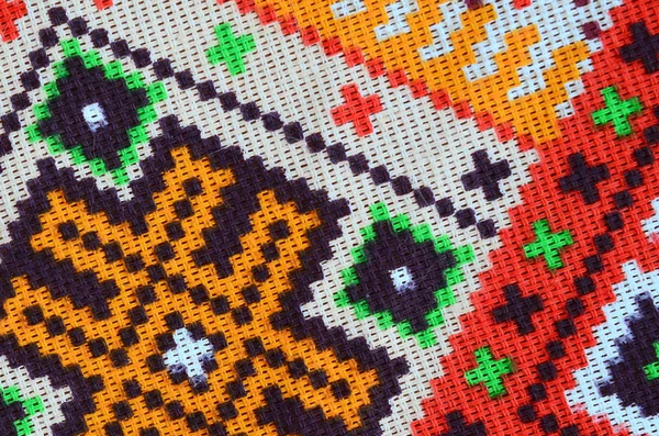 Traditional Ukrainian folk art knitted embroidery pattern on textile fabric — Stock Photo, Image