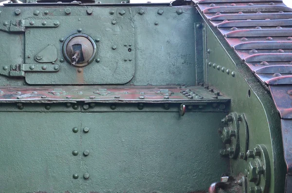 Abstract green industrial metal textured background with rivets and bolts