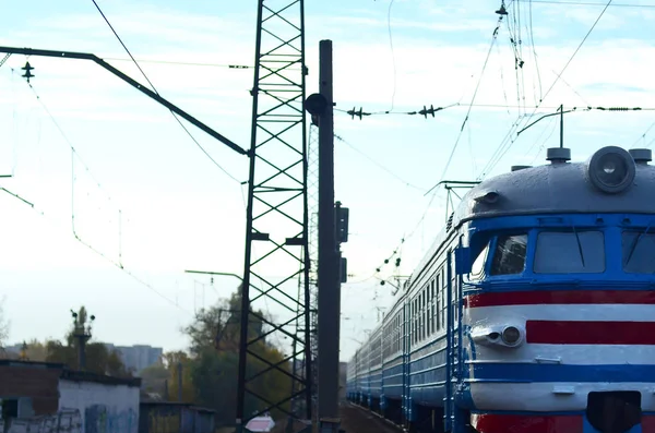 Old soviet electric train with outdated design moving by rail — Stock Photo, Image