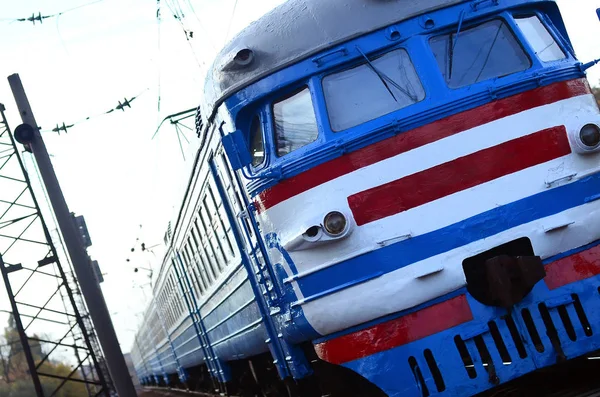 Old soviet electric train with outdated design moving by rail — Stock Photo, Image