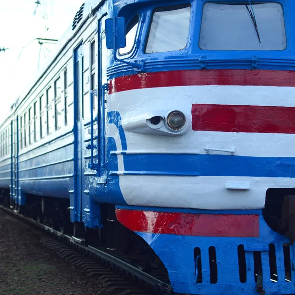 Old soviet electric train with outdated design moving by rail — Stock Photo, Image