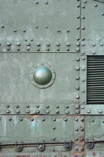 Abstract groene industriële metalen textuur achtergrond met klinknagels en bouten — Stockfoto