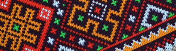 Traditional Ukrainian folk art knitted embroidery pattern on textile fabric — Stock Photo, Image