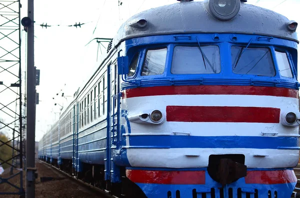 Old soviet electric train with outdated design moving by rail — Stock Photo, Image