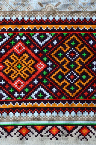 Traditional Ukrainian folk art knitted embroidery pattern on textile fabric — Stock Photo, Image