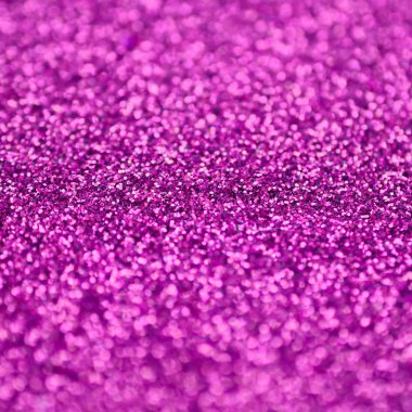 Pembe dekoratif payetler. Küçük öğelerden parlak bokeh ışıkları ile arka plan görüntüsü