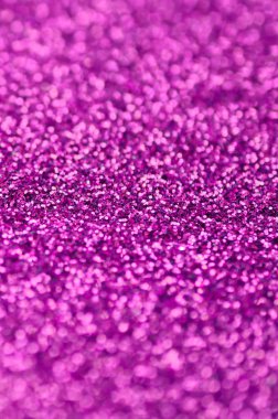 Pembe dekoratif payetler. Küçük öğelerden parlak bokeh ışıkları ile arka plan görüntüsü