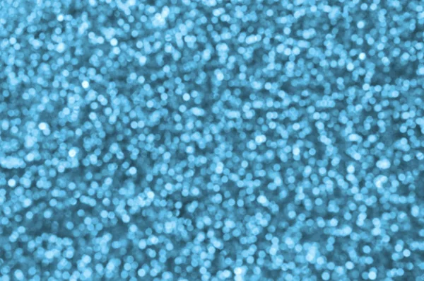 Sfocate paillettes decorative blu. Immagine di sfondo con luci bokeh lucide da piccoli elementi — Foto Stock