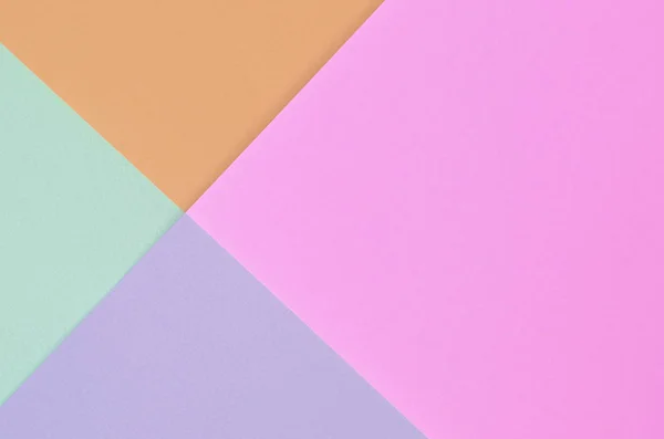 Tekstura tła mody pastelowych kolorach. Papier różowy, fioletowy, pomarańczowy i niebieski wzór geometryczny. — Zdjęcie stockowe