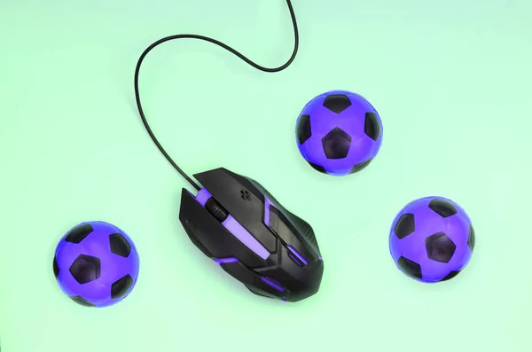 Optical gaming mouse and small violet footballs