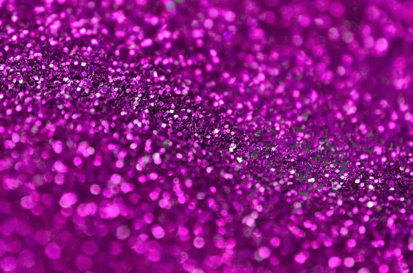 Rosa Zierpailletten. Hintergrundbild mit glänzenden Bokeh-Lichtern aus kleinen Elementen — Stockfoto