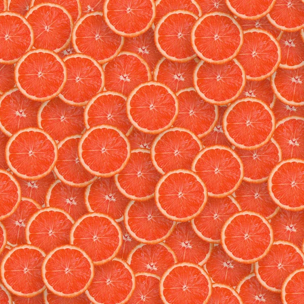 Padrão de fatias de citrinos de toranja vermelha. Citrinos flat lay — Fotografia de Stock