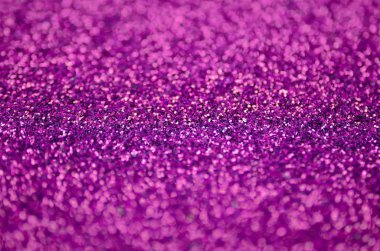 Pembe dekoratif payetler. Küçük öğelerden parlak bokeh ışıkları ile arka plan görüntüsü