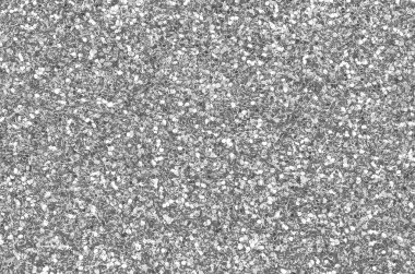 Gümüş dekoratif pullar. Küçük elementlerin parlak bokeh ışıklarıyla arkaplan resmi