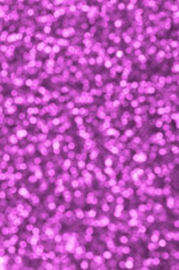 Bulanık pembe dekoratif payetler. Küçük öğelerden parlak bokeh ışıkları ile arka plan görüntüsü
